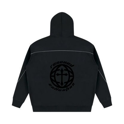 A black zip-up hoodie shown from the back, featuring a large black circular graphic with a cross and the words 'rescue collection' printed on the center back. Thin white piping details run across the shoulders and down the sleeves.