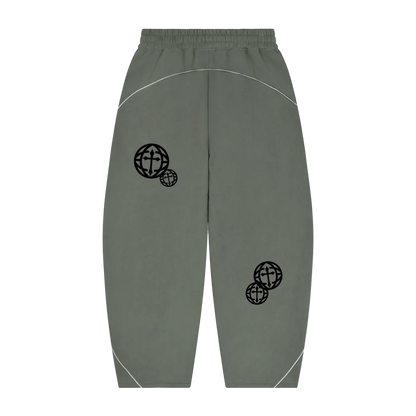 A pair of olive green sweatpants with black globe graphics on the legs and thin white curved piping details, shown against a plain white background.