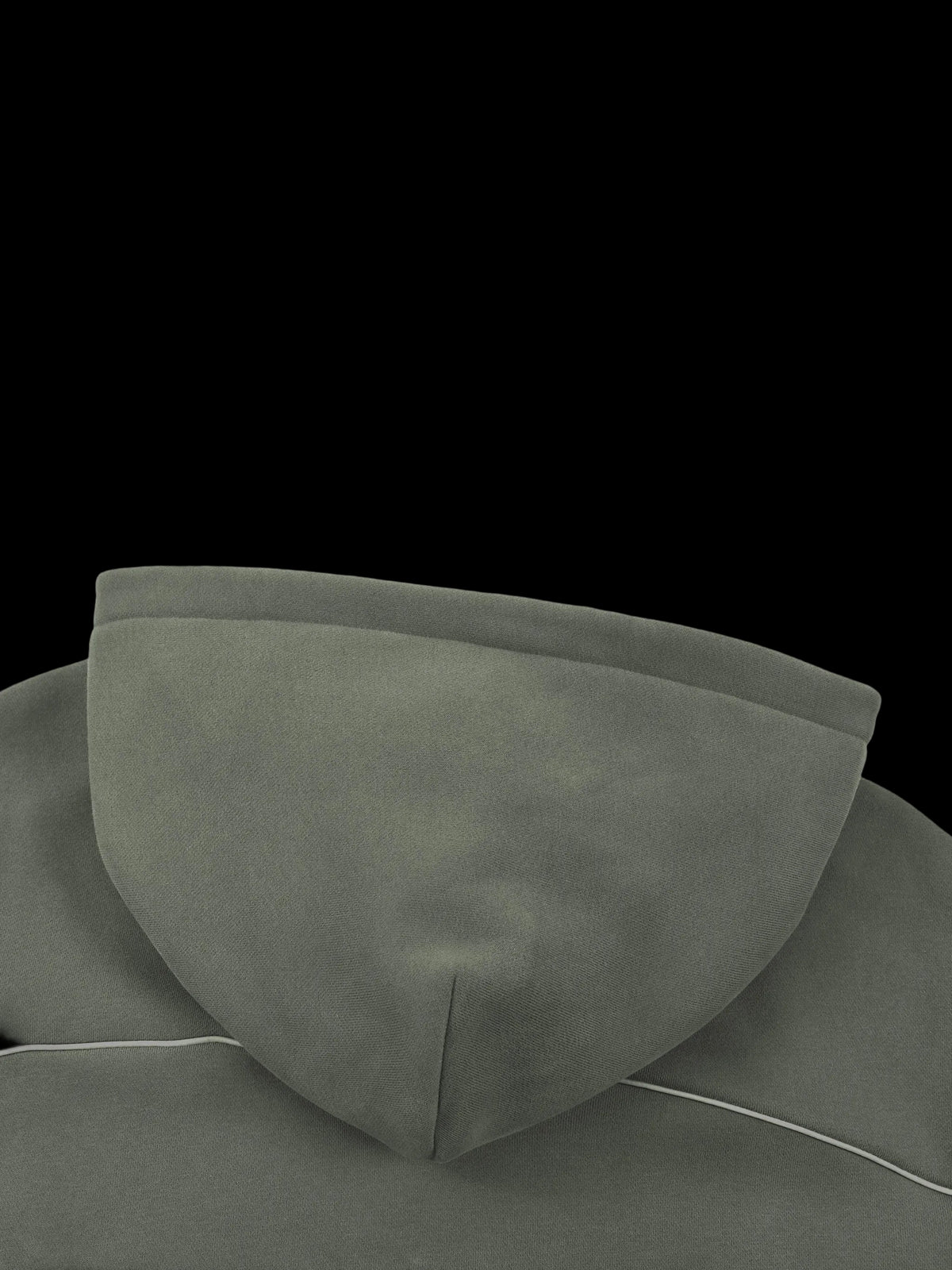 Close-up of the hood of a dark olive green hoodie, showing the fabric texture and a thin white contrast stitch along the edge, set against a plain white background.