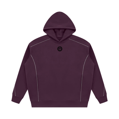 A dark plum purple pullover hoodie with white contrast stitching details and a small black circular logo on the chest, displayed on a solid white background.