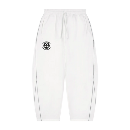 White sweatpants with a black circular logo on the left chest, featuring a drawstring waist and side piping details.