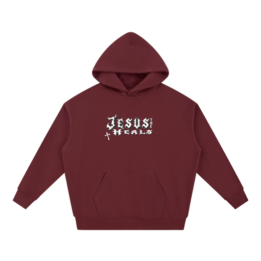 Maroon hoodie with a small graphic on the chest against a white background